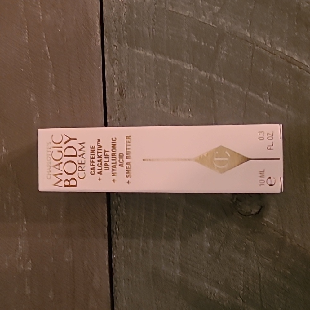 Charlotte Tilbury Magic Body Cream with Gold Accents‎